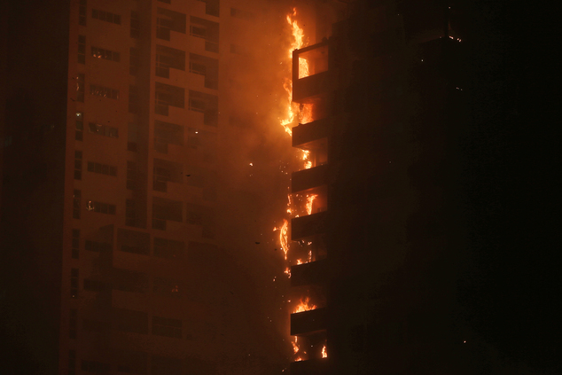 APTOPIX Mideast Emirates Skyscrapper Fire