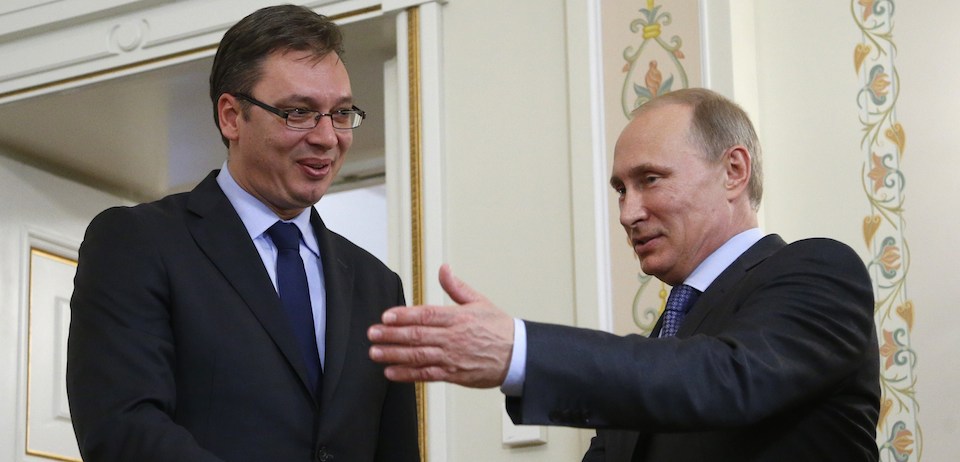 Russia's President Vladimir Putin (R) invites for talks Serbian Prime Minister Aleksandar Vucic (L) during their meeting in the Novo-Ogaryovo residence, outside Moscow, on July 8, 2014. Russia and Serbia are ready to start procedures of signing an agreement on the South Stream gas pipeline in the next few days, the Itar-TASS news agency quoted Russia's Prime Minister Dmitry Medvedev as saying yesterday after his talks with Vucic. The 16-billion-euro ($21.8 billion) South Stream pipeline would stretch nearly 2,500 kilometres (1,500 miles) from Russia under the Black Sea to Bulgaria, Serbia, Hungary and Slovenia before reaching a terminal in Italy. It is an attempt to reduce Moscow's reliance on Ukraine as a transit country for its natural gas following disputes with Kiev in 2006 and 2009 that led to interruptions of gas supplies to Europe. AFP PHOTO / POOL/ MAXIM SHIPENKOV        (Photo credit should read MAXIM SHIPENKOV/AFP/Getty Images)