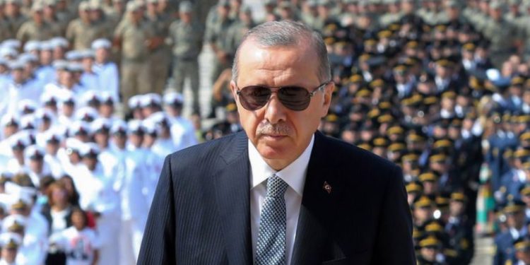 TOPSHOT - Turkish President Recep Tayyip Erdogan (C) visits the Mausoleum of Mustafa Kemal Ataturk, founder of modern Turkey, during a ceremony marking the 96th anniversary of Victory Day, commemorating a decisive battle in the Turkish War of Independence, in Ankara, on August 30, 2018. (Photo by ADEM ALTAN / AFP)        (Photo credit should read ADEM ALTAN/AFP/Getty Images)