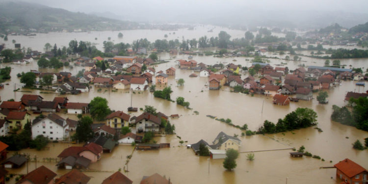 DOBOJ, BOSNIA AND HERZEGOVINA - MAY 16:  The aerial view of many homes and lands submerged due to overflow of rivers is seen in Doboj, northern city of Bosnia and Herzegovina on May 16, 2014. (Photo by Kemal Zorlak/Anadolu Agency/Getty Images)