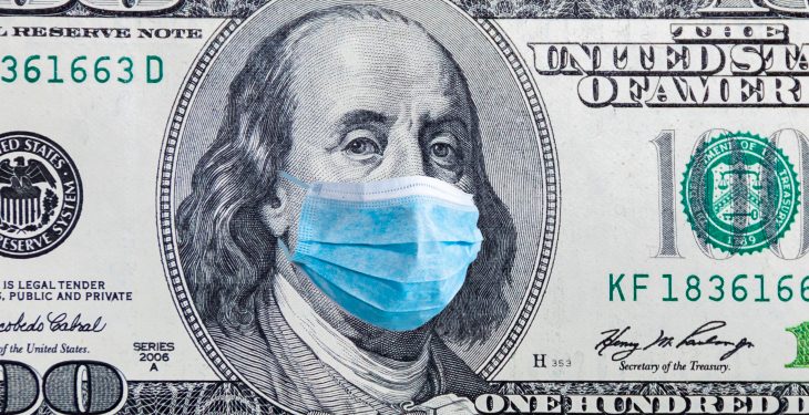 Coronavirus Wuhan. US quarantine, 100 dollar banknote with medical mask. The concept of epidemic and protection against coronavrius.