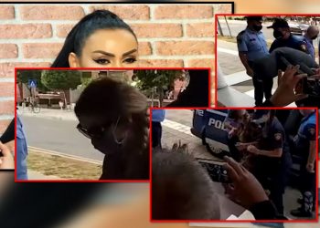 VIDEO/ Me fustan me lule, maskë dhe flokët gërshet, Fjolla Morina mbërrin në Gjykatë. Biznesmeni dhe shoferi futen me kapuç në kokë