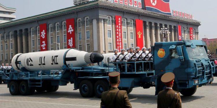 FILE PHOTO: Military vehicles carry missiles with characters reading 'Pukkuksong' during a military parade marking the 105th birth anniversary of North Korea's founding father, Kim Il Sung, in Pyongyang, North Korea, April 15, 2017.     REUTERS/Sue-Lin Wong/File Photo