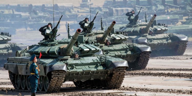 Russian tanks parade at the end of the day of the Vostok-2018 (East-2018) military drills at Tsugol training ground not far from the borders with China and Mongolia in Siberia, on September 13, 2018. (Photo by Mladen ANTONOV / AFP)