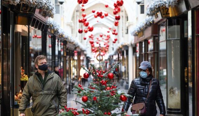 People walk through the Burlington Arcade adorned with Christmas decorations, amid the coronavirus disease (COVID-19) outbreak, in London, Britain, November 23, 2020. REUTERS/Henry Nicholls