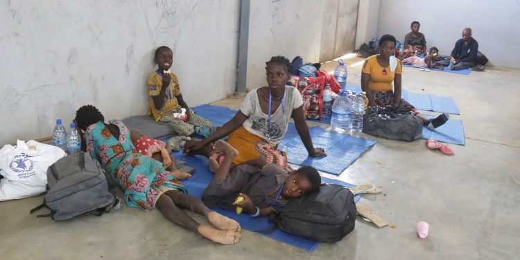 Refugees seek shelter at a centre in Afungi, Mozambique after fleeing attacks in Palma in Northern Mozambique Friday April 2, 2021. Southern African Development Community leaders will meet in Maputo, Mozambique for two days starting Thursday, April 8, 2021, to deliberate on measures to address terrorism in the northern area of the country. (AP Photo)