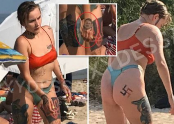 FOTOT/ Gruaja me tatuazh kryqi të thyer, portret të Hitlerit, tmerron plazhistët në Ukrainë