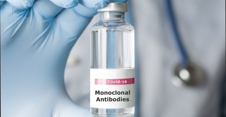 Doctor hold a vial of monoclonal antibodies, a new treatment for coronavirus Covid-19