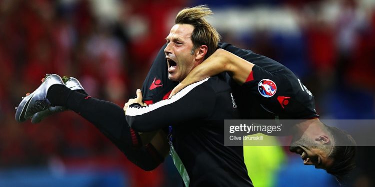 LYON, FRANCE - JUNE 19:  Assistant coach Paolo Tramezzani of Albania holding Elseid Hysaj celebrates their 1-0 win after the UEFA EURO 2016 Group A match between Romania and Albania at Stade des Lumieres on June 19, 2016 in Lyon, France.  (Photo by Clive Brunskill/Getty Images)