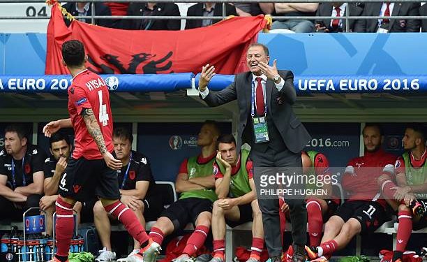 Albania's coach Gianni De Biasi speaks with Albania's defender Elseid Hysaj during the Euro 2016 group A football match between Albania and Switzerland at the Bollaert-Delelis Stadium in Lens on June 11, 2016. / AFP / PHILIPPE HUGUEN        (Photo credit should read PHILIPPE HUGUEN/AFP via Getty Images)