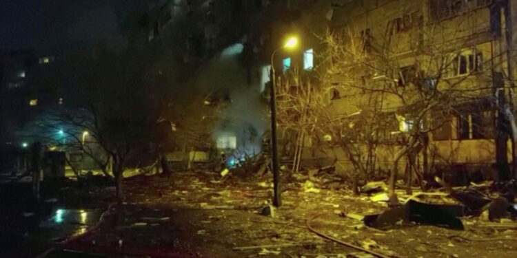 A view of a damaged residential building, after Russia launched a massive military operation against Ukraine, in Kyiv, Ukraine, February 25, 2022 in this still image taken from video.  Ukrainian Ministry of Emergencies/via Reuters TV/Handout via REUTERS   ATTENTION EDITORS - THIS IMAGE HAS BEEN SUPPLIED BY A THIRD PARTY. NO RESALES. NO ARCHIVES