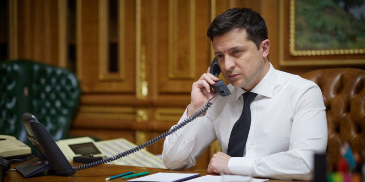 Ukraine's President Volodymyr Zelenskiy speaks by phone with U.S. President Joe Biden in Kyiv, Ukraine December 9, 2021. Ukrainian Presidential Press Service/Handout via REUTERS