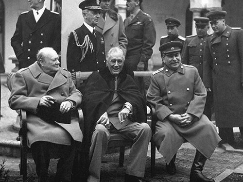 Conference of the Big Three at Yalta makes final plans for the defeat of Germany.  Here the "Big Three" sit on the patio together, Prime Minister Winston S. Churchill, President Franklin D. Roosevelt, and Premier Josef Stalin.  February 1945. (Army)
Exact Date Shot Unknown
NARA FILE #:  111-SC-260486
WAR & CONFLICT BOOK #:  750