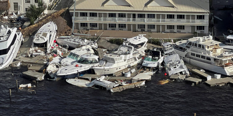 An aerial view of damaged boats after Hurricane Ian caused widespread destruction in Fort Myers, Florida, U.S., September 29, 2022. REUTERS/Shannon Stapleton