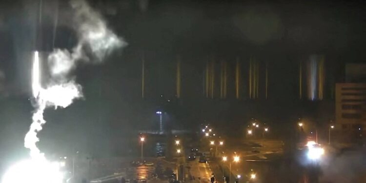 Surveillance camera footage shows a flare landing at the Zaporizhzhia nuclear power plant during shelling in Enerhodar, Zaporizhia Oblast, Ukraine March 4, 2022, in this screengrab from a video obtained from social media. Zaporizhzhya NPP via YouTube/via REUTERS  THIS IMAGE HAS BEEN SUPPLIED BY A THIRD PARTY. MANDATORY CREDIT. NO RESALES. NO ARCHIVES. REFILE - ADDITIONAL CAPTION INFORMATION