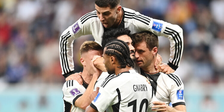 DOHA, QATAR - NOVEMBER 23: Ilkay Guendogan of Germany celebrates with teammates after scoring their team's first goal via a penalty during the FIFA World Cup Qatar 2022 Group E match between Germany and Japan at Khalifa International Stadium on November 23, 2022 in Doha, Qatar. (Photo by David Ramos - FIFA/FIFA via Getty Images)