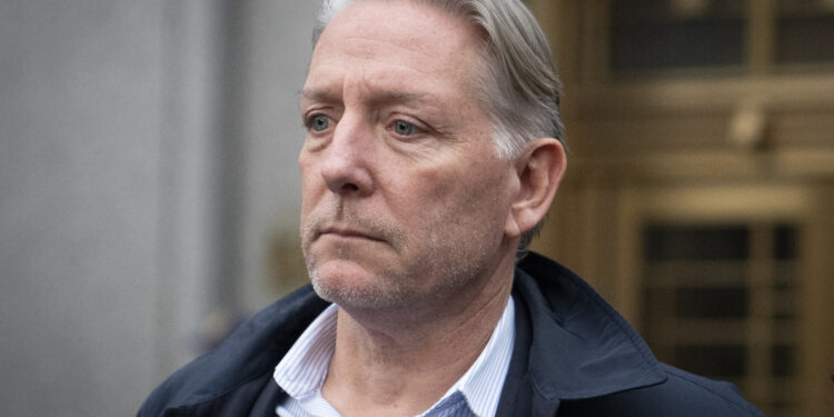 Charles McGonigal, former special agent in charge of the FBI's counterintelligence division in New York, leaves court, Monday, Jan. 23, 2023, in New York. The former high-ranking FBI counterintelligence official has been indicted on charges he helped a Russian oligarch, in violation of U.S. sanctions. (AP Photo/John Minchillo)