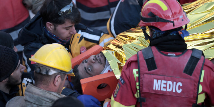 HATAY, TURKIYE - FEBRUARY 12: 35-year-old Mustafa Sarigul is rescued from under the rubble of the collapsed building 149 hours after 7.7 and 7.6 magnitude earthquakes hit Turkiye's multiple provinces, including Hatay, Turkiye on February 12, 2023. Early Monday morning, a strong 7.7 earthquake, centered in the Pazarcik district, jolted Kahramanmaras and strongly shook several provinces, including Gaziantep, Kahramanmaras, Diyarbakir, Adana, Adiyaman, Malatya, Osmaniye, Hatay, and Kilis. Later, at 13.24 p.m. (1024GMT), a 7.6 magnitude quake centered in Kahramanmaras' Elbistan district struck the region. Turkiye declared 7 days of national mourning after deadly earthquakes in southern provinces. (Photo by Mustafa Yilmaz/Anadolu Agency via Getty Images)