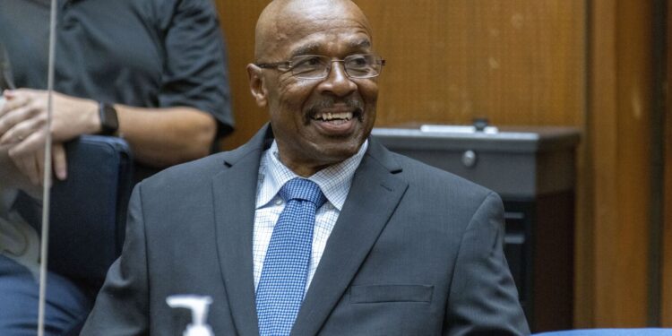 In this photo provided by Cal State LA, Maurice Hastings smiles at a hearing at Los Angeles Superior Court where a judge dismissed his conviction for murder after new DNA evidence exonerated him, Oct. 20, 2022, in Los Angeles. (J. Emilio Flores/Cal State LA via AP)