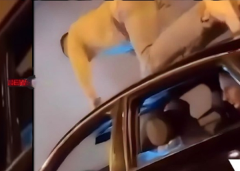 VIDEO/ Çmenduri në rrugët e Tiranës, shoferi del nga dritarja dhe bën pompa mbi makinë ndërsa ecën me shpejtësi