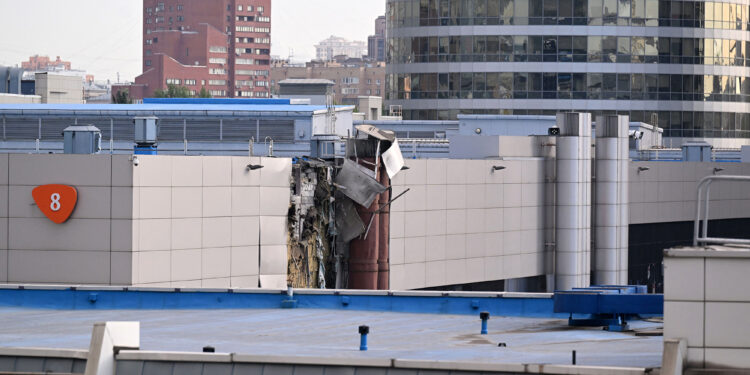 This photo shows damaged on an Expocentre building following a drone attack in Moscow on August 18, 2023. Russia's defence ministry said its air force downed a Ukrainian drone over the capital at about 04:00 (0100 GMT) on August 18. Russian forces have destroyed Ukrainian drones targeting Moscow and its Black Sea Fleet, officials said, the latest in a surge of attacks on the capital and the flashpoint waterway. (Photo by NATALIA KOLESNIKOVA / AFP) (Photo by NATALIA KOLESNIKOVA/AFP via Getty Images)