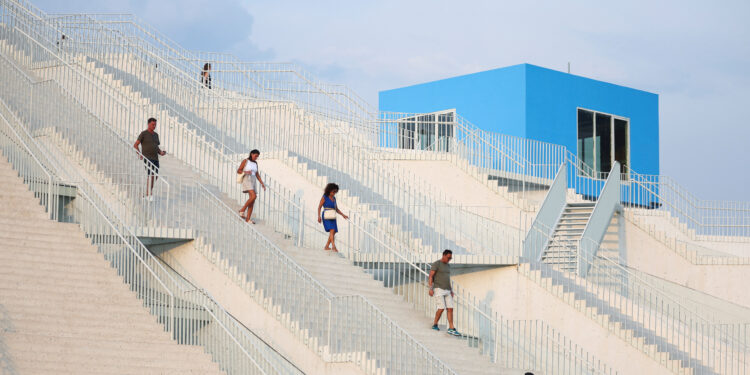 Tourists visit the redesigned pyramid that was formerly a museum built to honour late Communist dictator Enver Hoxha, in Tirana, Albania, August 18, 2023