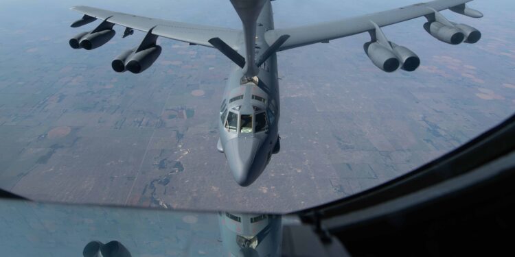 A KC-135 Stratotanker refuels a B-52 Stratofortess, departing McGhee Tyson Air National Guard Base, Tenn., for a 72-hour endurance mission Oct. 6, 2022. For more than 72-hours, the KC-135 only landed to refuel, change crews, and service engine oil while keeping at least one engine running. (U.S. Air Force photo by Airman 1st Class Jenna A. Bond)