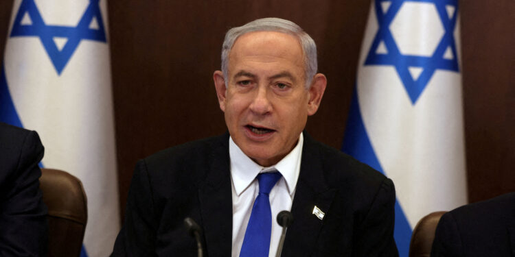 FILE PHOTO: Israeli Prime Minister Benjamin Netanyahu, chairs a weekly cabinet meeting at the Prime Minister's office in Jerusalem, on January 15, 2023. Menahem Kahana/Pool via REUTERS/File Photo