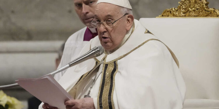 Pope Francis presides over Christmas eve Mass, at St. Peter's Basilica at the Vatican, Sunday Dec. 24, 2023. (AP Photo/Gregorio Borgia)