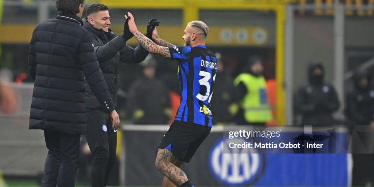 MILAN, ITALY - DECEMBER 09: Federico Dimarco of FC Internazionale celebrates after scoring his team's second goal with teammate Kristjan Asllani during the Serie A TIM match between FC Internazionale and Udinese Calcio at Stadio Giuseppe Meazza on December 09, 2023 in Milan, Italy. (Photo by Mattia Ozbot - Inter/Inter via Getty Images)