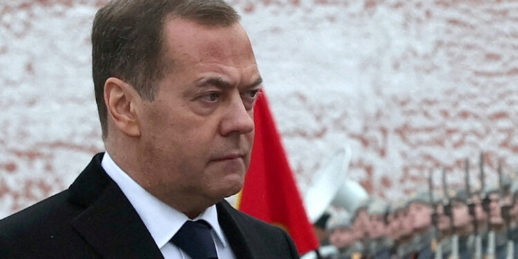 FILE PHOTO: Russia's Deputy head of the Security Council Dmitry Medvedev takes part in a wreath laying ceremony marking Defender of the Fatherland Day at the Tomb of the Unknown Soldier by the Kremlin Wall in Moscow, Russia, February 23, 2024. Sputnik/Yekaterina Shtukina/Pool via REUTERS/File Photo