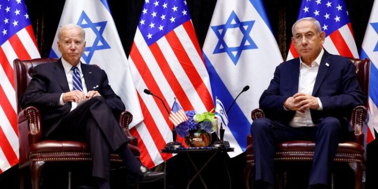 FILE PHOTO: U.S. President Joe Biden meets with Israeli Prime Minister Benjamin Netanyahu and the Israeli war cabinet, as he visits Israel amid the ongoing conflict between Israel and Hamas, in Tel Aviv, Israel, October 18, 2023. REUTERS/Evelyn Hockstein/File Photo