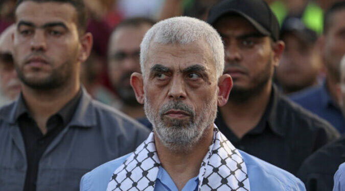 Head of the political wing of the Palestinian Hamas movement in the Gaza Strip Yahya Sinwar attends a rally in support of Jerusalem's al-Aqsa mosque in Gaza City on October 1, 2022. (Photo by MAHMUD HAMS / AFP)