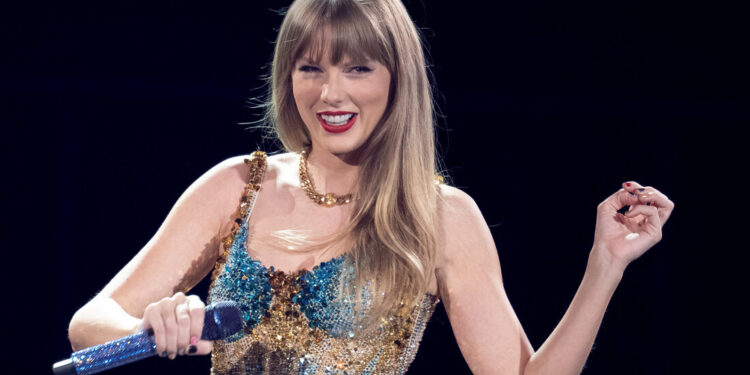 US singer-songwriter Taylor Swift performs onstage on the first night of her "Eras Tour" at AT&T Stadium in Arlington, Texas, on March 31, 2023. (Photo by SUZANNE CORDEIRO / AFP) (Photo by SUZANNE CORDEIRO/AFP via Getty Images)