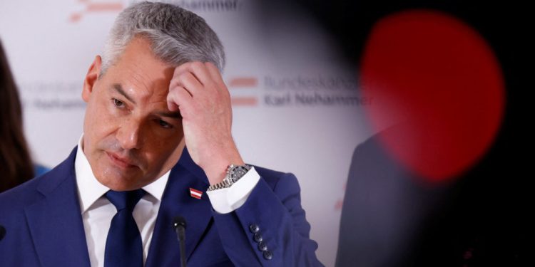 Head of Peoples Party (OEVP) and Chancellor Karl Nehammer addresses the media during the presentation of their election program in Vienna, Austria, September 5, 2024. REUTERS/Leonhard Foeger