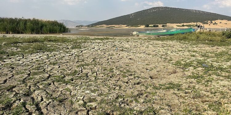ISPARTA, TURKIYE - AUGUST 24: A view of Mada Island, Turkiye's only inhabited lake island, affected by drought in the Sarkikaraagac district of Isparta, Turkiye, on August 24, 2025. (Photo by Bahadir Arici/Anadolu via Getty Images)
