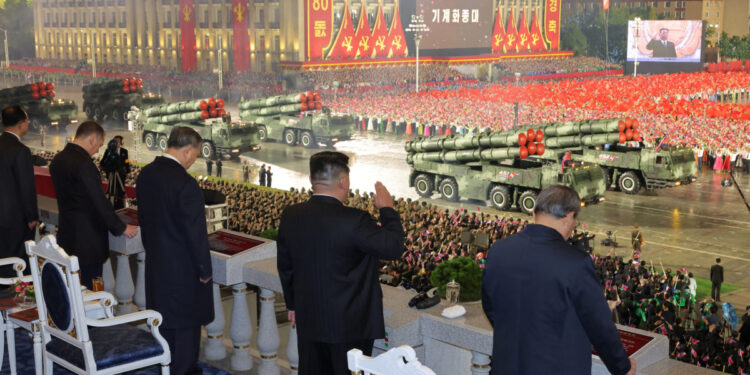 North Korean leader Kim Jong Un watches a military parade celebrating the 80th anniversary of the founding of the ruling Workers' Party of Korea (WPK), in Pyongyang, North Korea, in this pictured released October 11, 2025 by North Korea's official Korean Central News Agency. KCNA via REUTERS ATTENTION EDITORS - THIS IMAGE WAS PROVIDED BY A THIRD PARTY. REUTERS IS UNABLE TO INDEPENDENTLY VERIFY THIS IMAGE. NO THIRD PARTY SALES. SOUTH KOREA OUT. NO COMMERCIAL OR EDITORIAL SALES IN SOUTH KOREA.