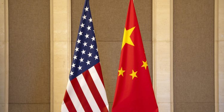 United States and Chinese flags are set up before a meeting between Treasury Secretary Janet Yellen and Chinese Vice Premier He Lifeng at the Diaoyutai State Guesthouse in Beijing, China, Saturday, July 8, 2023. (AP Photo/Mark Schiefelbein, Pool)