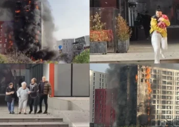 Pamje trishtuese! Nëna me foshnjën në krah dhe të moshuar nxitojnë tu shpëtojnë flakëve që përpinë pallatin në Tiranë (VIDEO)