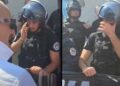 Polici i Kosovës përlotet pas vendimit të Hagës, protestuesit i japin flamurin e UÇK-së