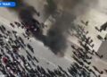 FOTO/ Nën ritmin e daulles dhe valles, deputetët dhe mbështetësit e PD-së djegin tryezën e dialogut të Ramës para Kryeministrisë!